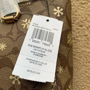 Brand new with tags fully wrapped never used Coach Alice Purse 9” x 7”